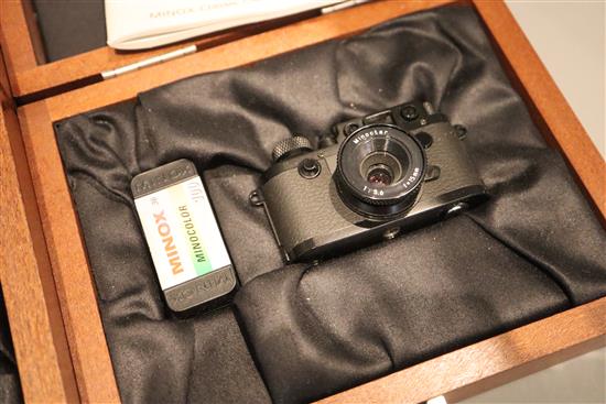 A cased Minox Leica miniature camera, a Minox glass, Contax 1 and a Minox Classic Leica III (3)